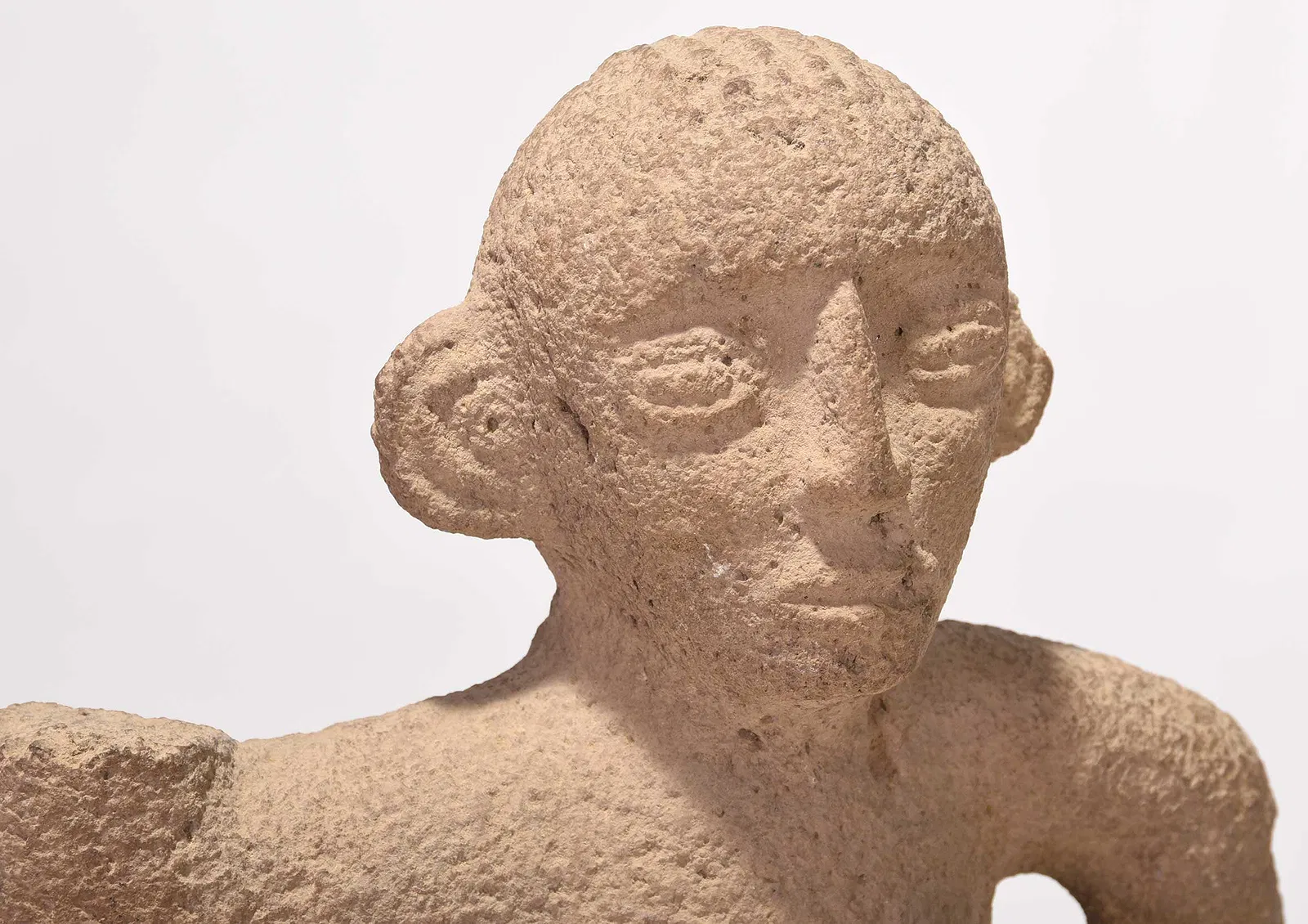 Pre-Columbian Stone Fragment of a Male Figure – Costa Rica, Atlantic Watershed, Circa 700–1100 CE
