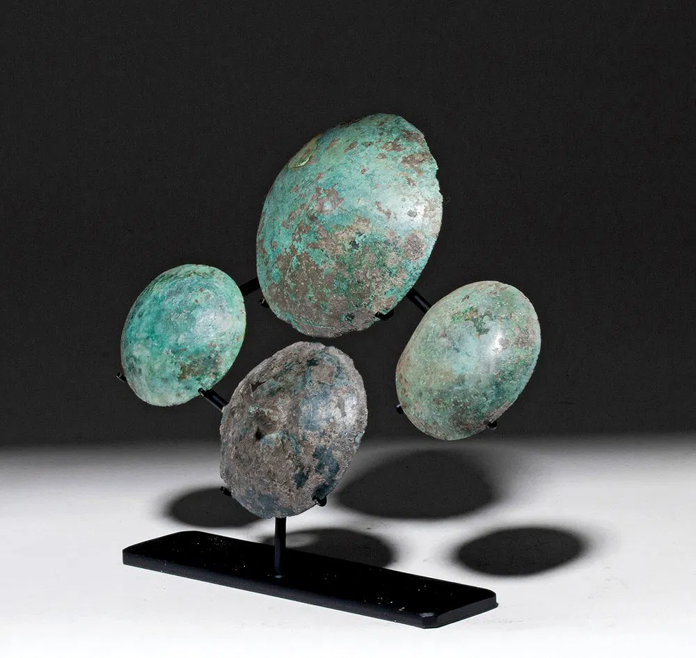 Group of Four Ancient Greek Bronze Shield Appliqués – Classical Period, 5th–4th Century BCE